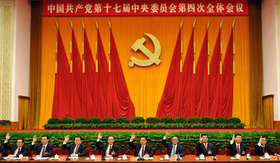 這是胡錦濤、吳邦國、溫家寶、賈慶林、李長春、習(xí)近平、李克強、賀國強、周永康在主席臺上。新華社記者黃敬文攝